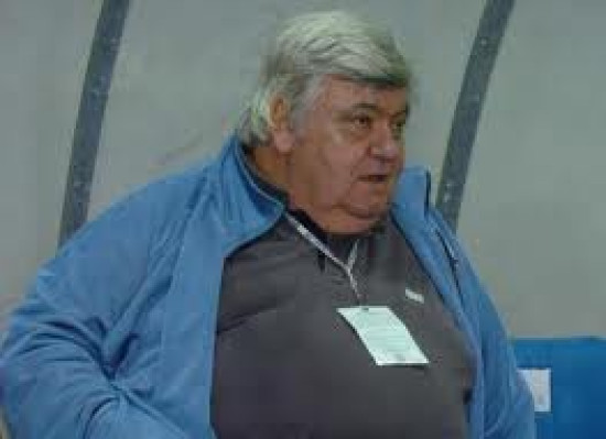 Rémi Garde donne un maillot de l'OL à "Loulou" Nicollin