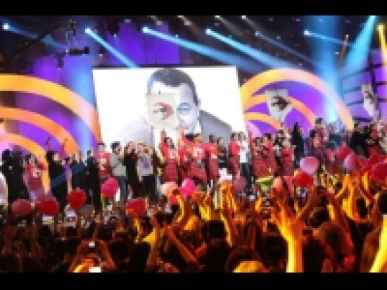 Quatre sportifs sur la sc&egrave;ne des Enfoir&eacute;s